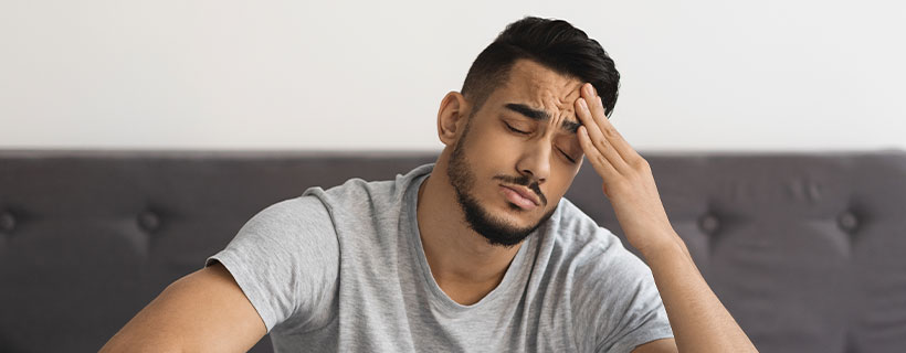 patient needing headache chiropractor in McKinney TX